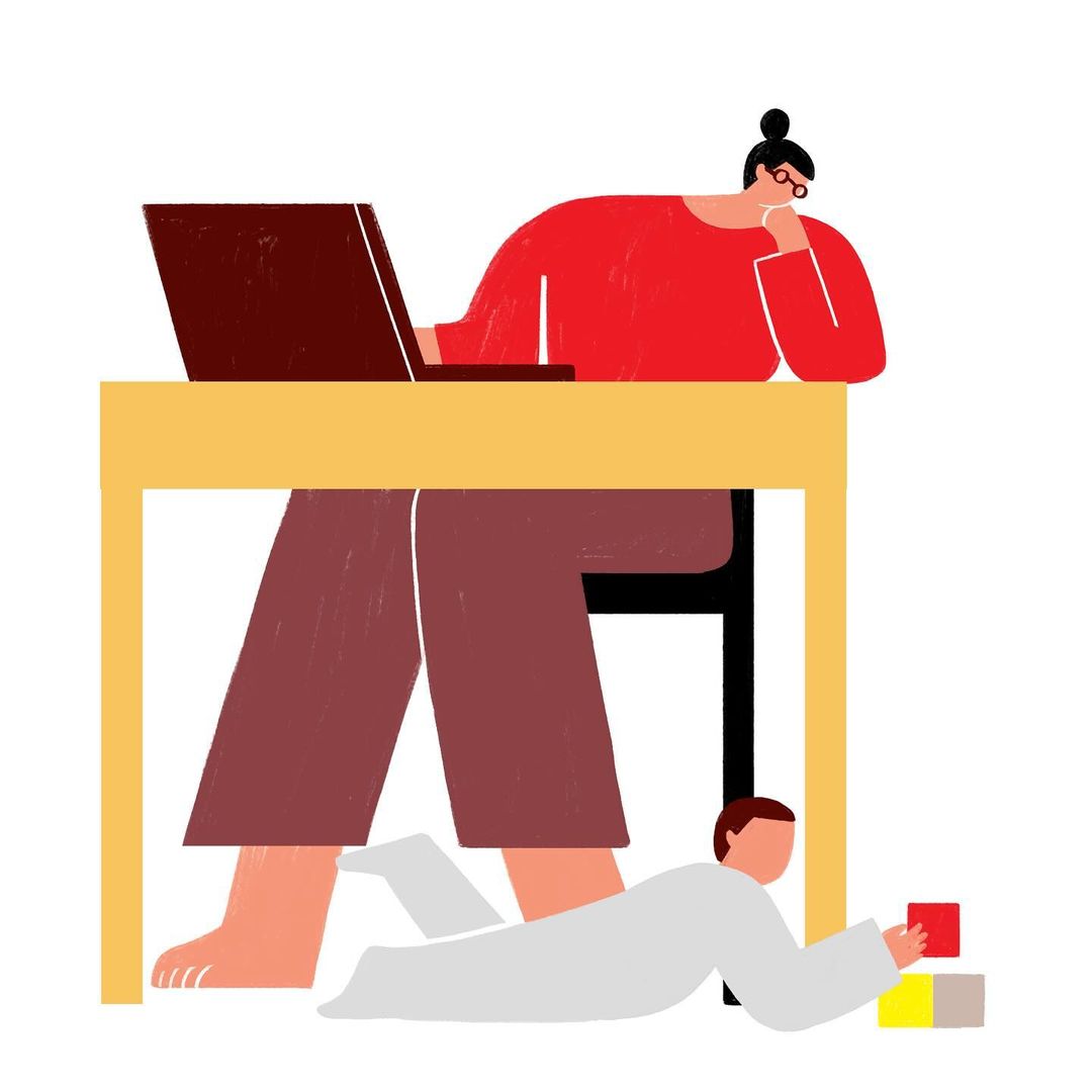 Illustration of a woman working at a desk on a laptop with a child playing on the floor with blocks. The scene is set indoors.