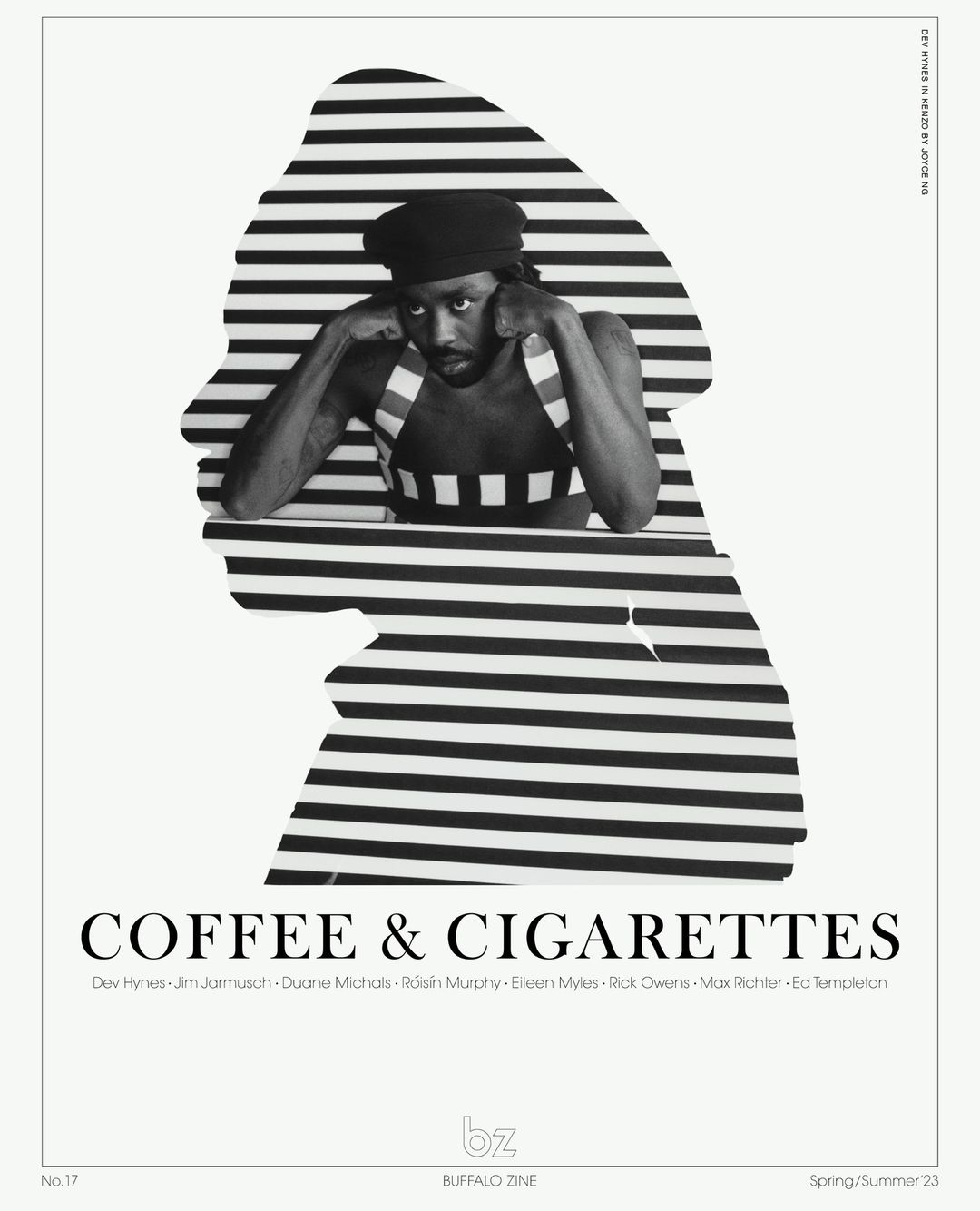 Monochrome image of a black model with short dreadlocks wearing a striped top, set against a horizontal striped background in a studio setting.