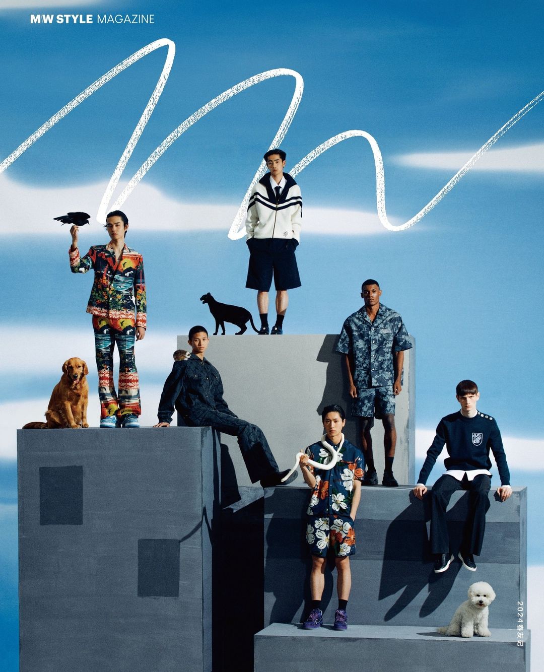 Six adult men pose on a multi-tiered grey concrete stage under a blue sky, with a golden retriever and toy poodle in the fashion editorial.