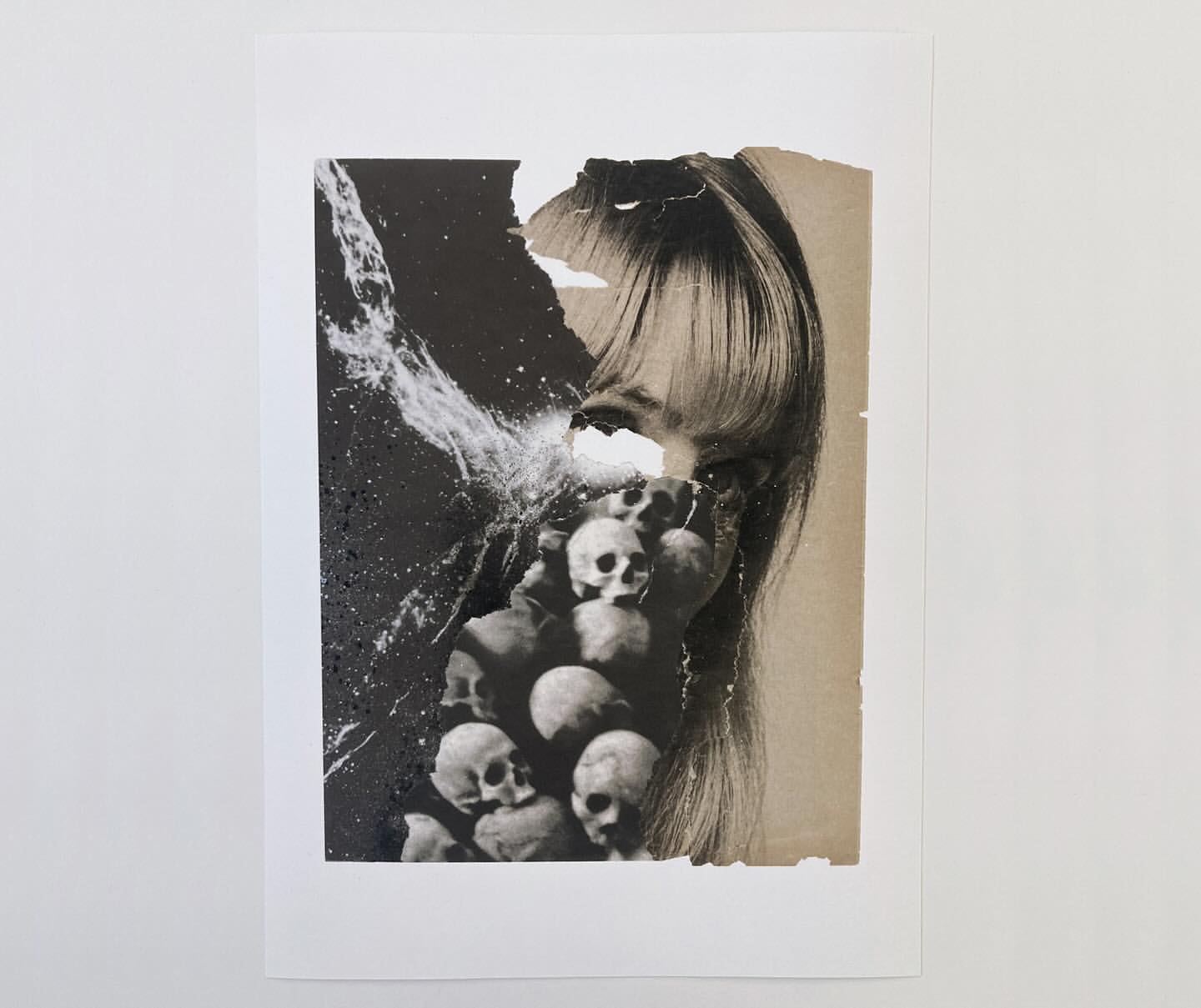 Collage art featuring a person's face integrated with an image of skulls, rendered in black and white with aged paper textures.