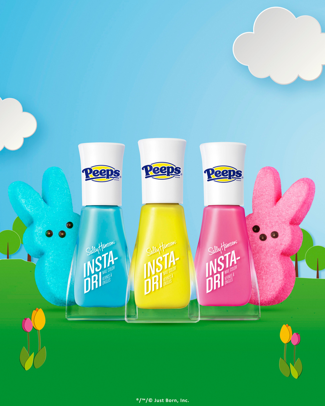Close-up of three nail polish bottles, each in a different color (blue, yellow, pink), with marshmallow bunny candies in the background.