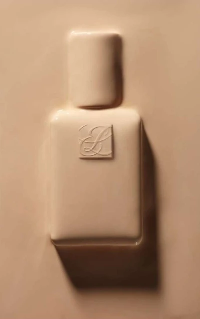 Beige background featuring a molded, lotion-like texture with a central raised impression of a cosmetic bottle and logo.