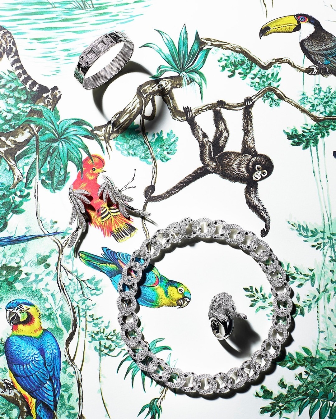 Jewelry set featuring a bracelet, necklace, and ring displayed on a vibrant jungle-themed background with illustrated tropical animals and foliage.