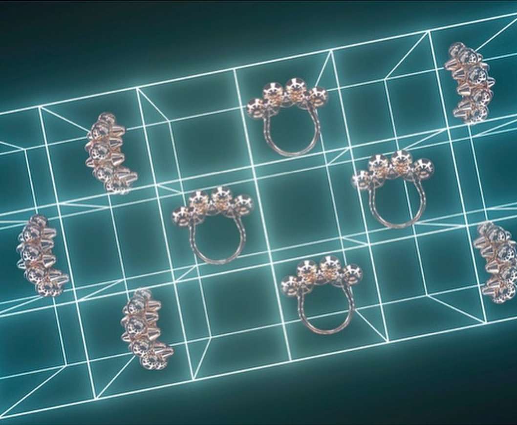 Several shiny gold and diamond rings on a blue grid background, creating a luxurious and modern jewellery showcase.