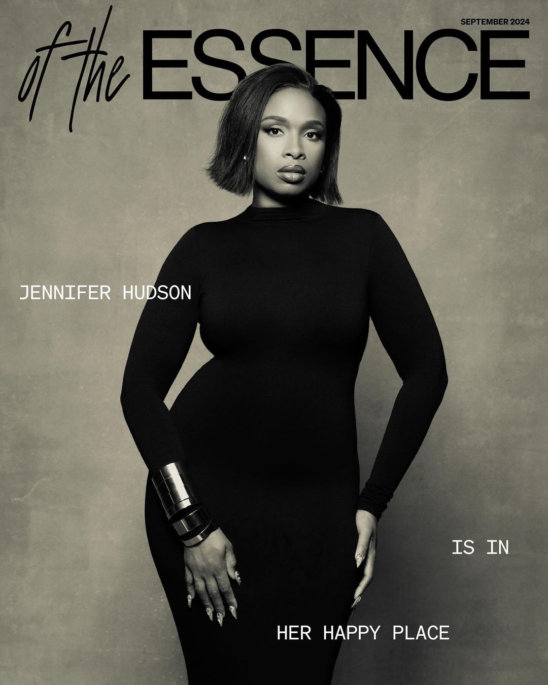 Essence magazine cover featuring Jennifer Hudson in a black dress with metallic cuff bracelet against a grey-toned backdrop.