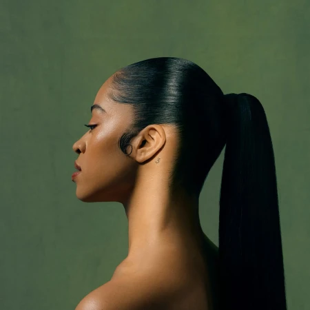 Profile portrait of a Black woman with sleek dark hair in a high ponytail against a muted green textured background
