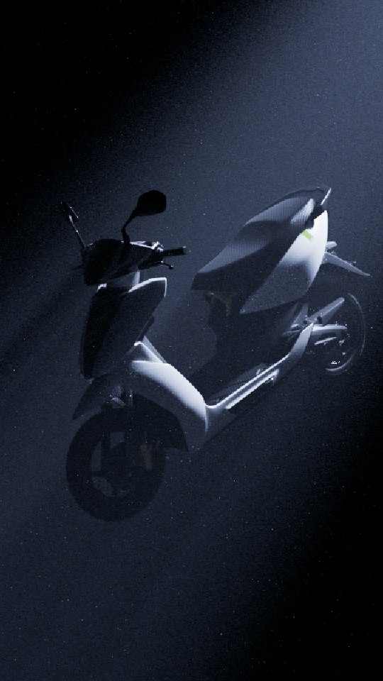 Electric scooter highlighted in a dark studio, showcasing its modern design and features with a sleek, minimalist aesthetic.