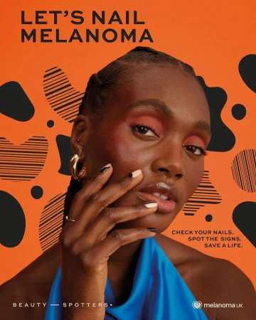 Portrait of a Black woman with braided hair wearing a bright blue top against an orange background with black abstract shapes