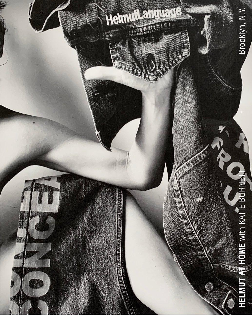 Monochrome fashion editorial image featuring denim clothing with bold lettering by photographer Katie Burnett.