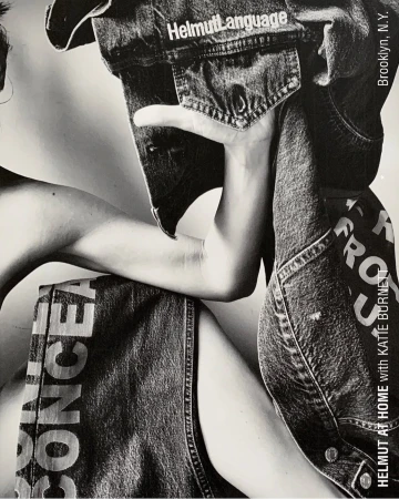 Monochrome fashion editorial image featuring denim clothing with bold lettering by photographer Katie Burnett.