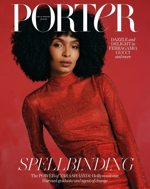 Magazine cover featuring a woman with a large afro hairstyle wearing a red sparkly turtleneck dress against a red background.