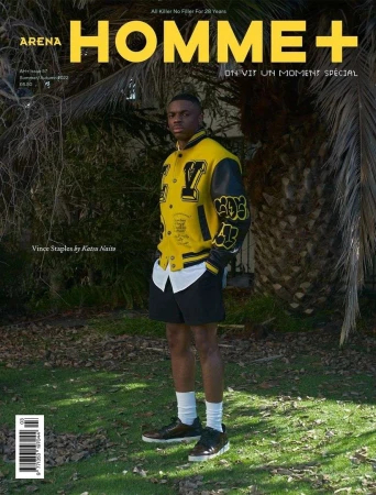 Arena Homme+ magazine cover featuring a full shot of Vince Staples in a yellow varsity jacket, black shorts, and sneakers.