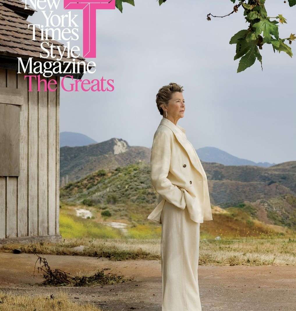 Outdoor shot of older woman in suit standing near building and hills for New York Times Style Magazine cover, "The Greats."