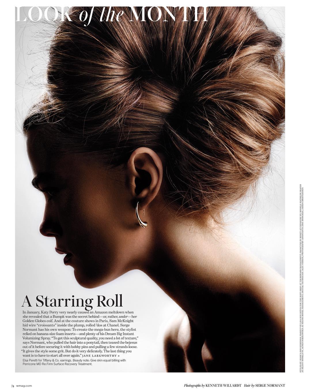 Woman's hairstyling featuring a high bun and hoop earrings. Fashion editorial for beauty product promotion and hair style trends.