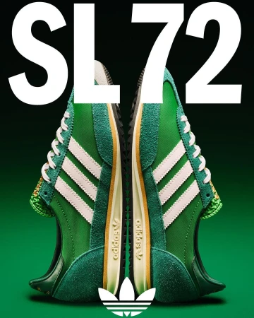 Two green Adidas SL 72 sneakers are displayed with white stripes and laces against a green and black gradient background.