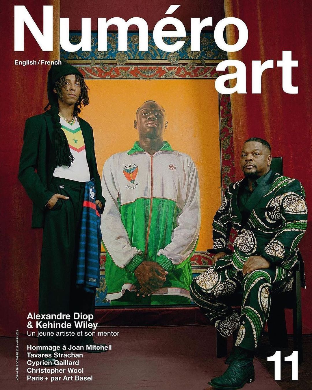 Numéro art magazine cover featuring two African men in stylish patterned suits and casual wear, alongside a portrait backdrop.