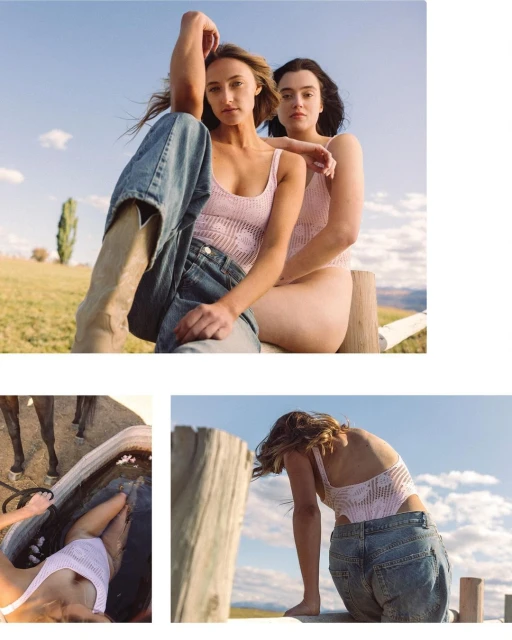 Two women pose in front of a field and blue sky. One wears jeans and cowboy boots. Both wear pale pink tops. Summer fashion.