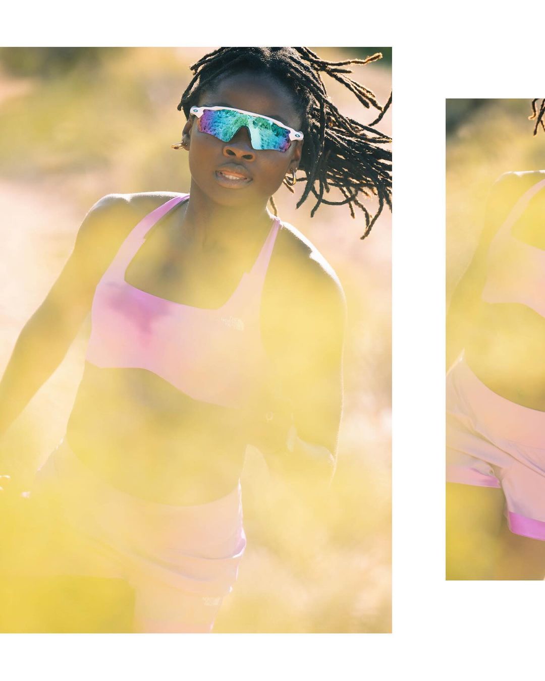 An African American woman running outdoors wearing a pink sports bra, matching shorts, and sunglasses, with blurry yellow foreground.