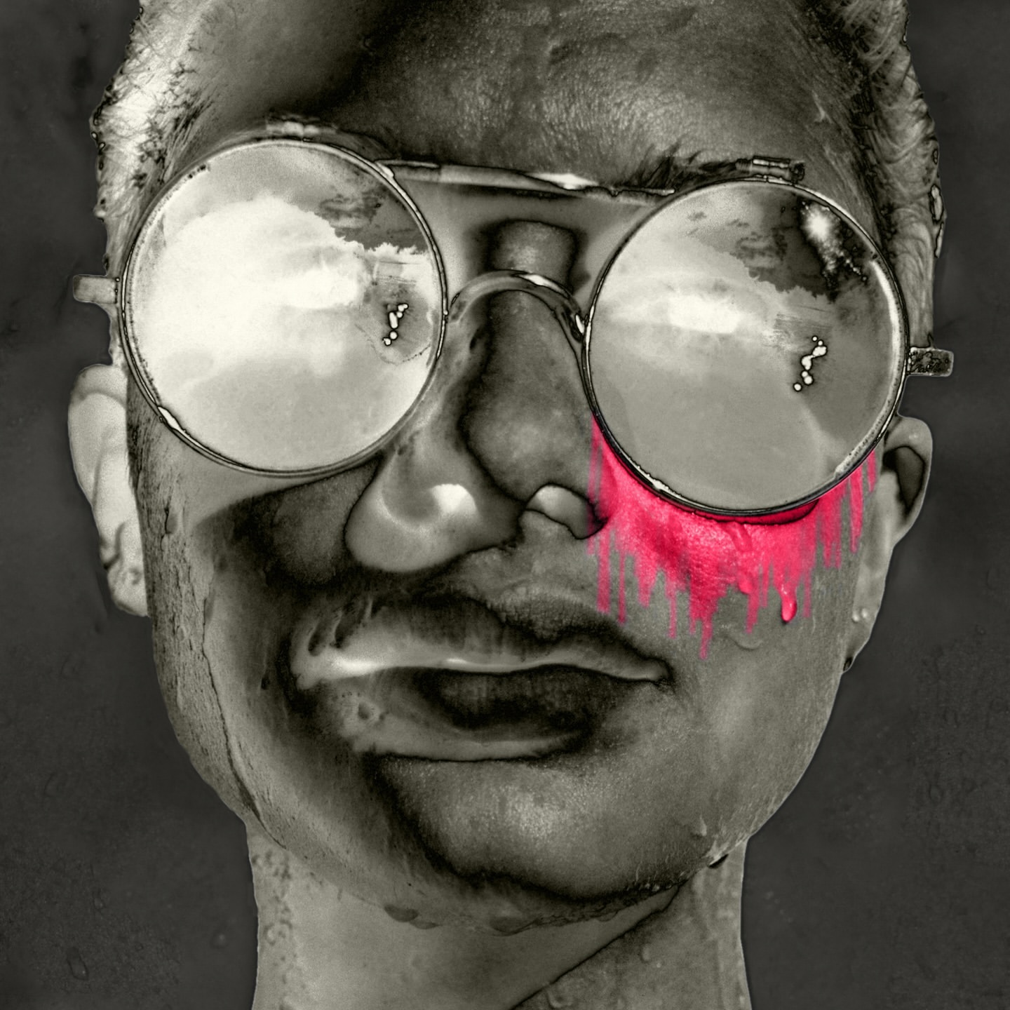 Surreal black and white portrait of a man with glasses, reflecting clouds. Red paint-like streaks run down his face, creating a striking visual.