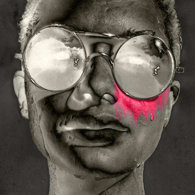 Surreal black and white portrait of a man with glasses, reflecting clouds. Red paint-like streaks run down his face, creating a striking visual.