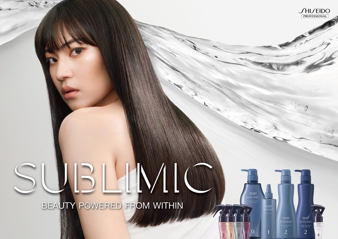 Cosmetic ad featuring a young woman with long, dark hair and various product bottles, promoting beauty and haircare.