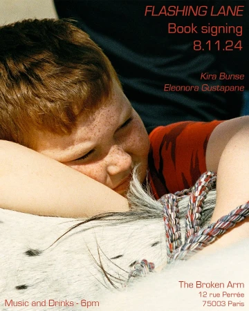 Boy with freckles rests head on braided object, with event promotion for Flashing Lane book signing on 8.11.24 at The Broken Arm, Paris.