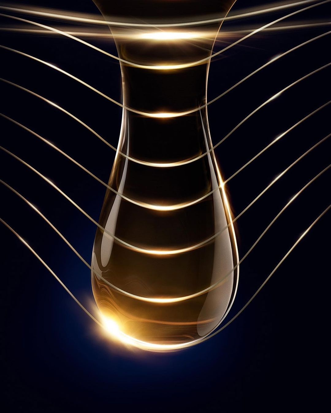 Abstract close-up of a golden, reflective liquid droplet against a dark background with golden lines, ideal for beauty and technology.