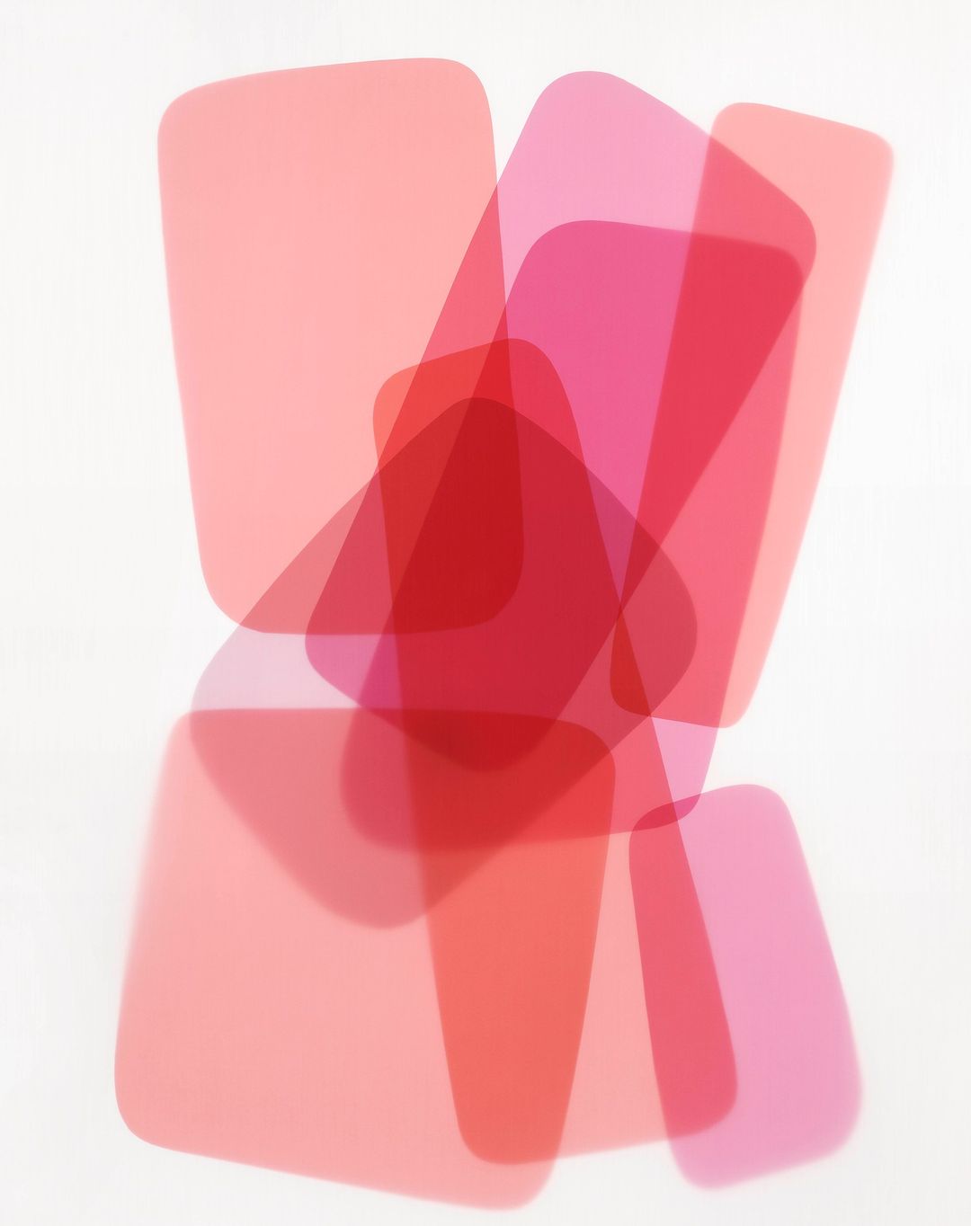 Abstract art featuring overlapping rounded rectangles in red and pink hues against a clean white background creating a modern design.