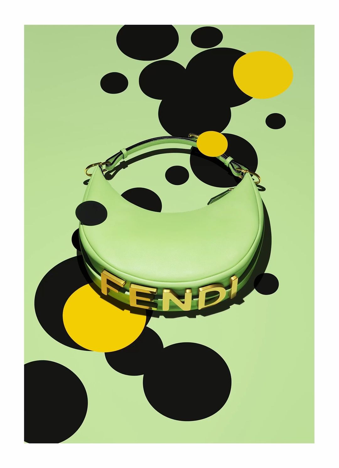 A light green Fendi handbag is showcased against a matching light green background with black and yellow circle accents.