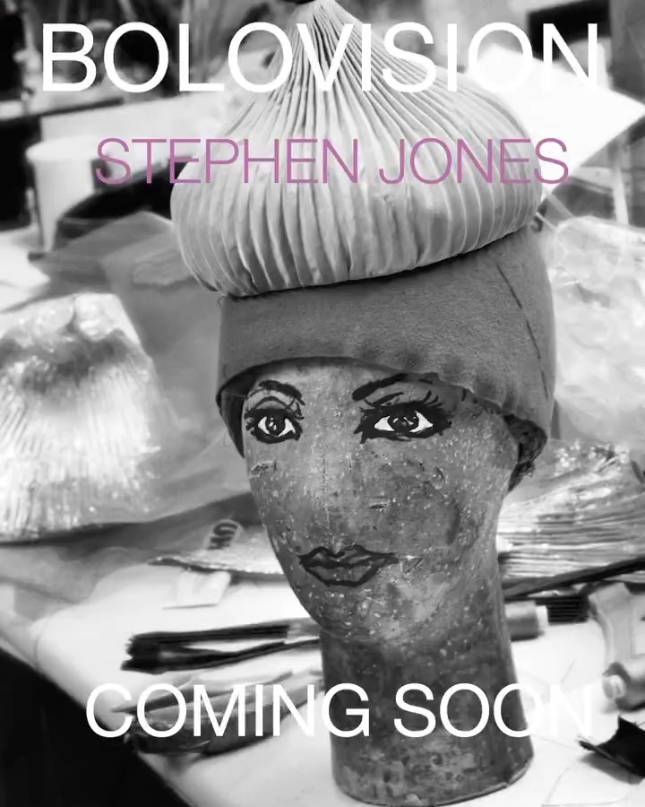 Monochrome studio shot of a painted mannequin head wearing a layered, pleated hat with the text 'Bolovision' and 'Coming Soon'.