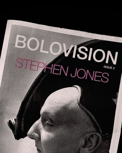 Close-up black and white portrait of a person wearing a structured hat, featured on a magazine cover titled BOLOVISION by Stephen Jones.