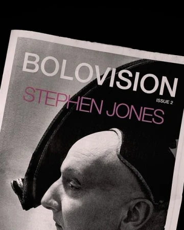 Close-up black and white portrait of a person wearing a structured hat, featured on a magazine cover titled BOLOVISION by Stephen Jones.