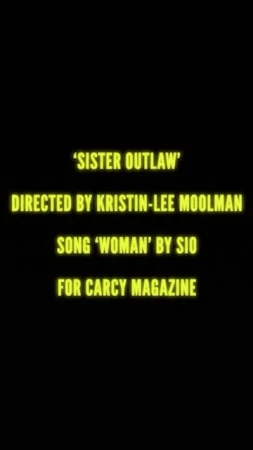 Text on a dark background displays the title 'Sister Outlaw' directed by Kristin-Lee Moolman, song 'Woman' by Sio for Carcy Magazine.