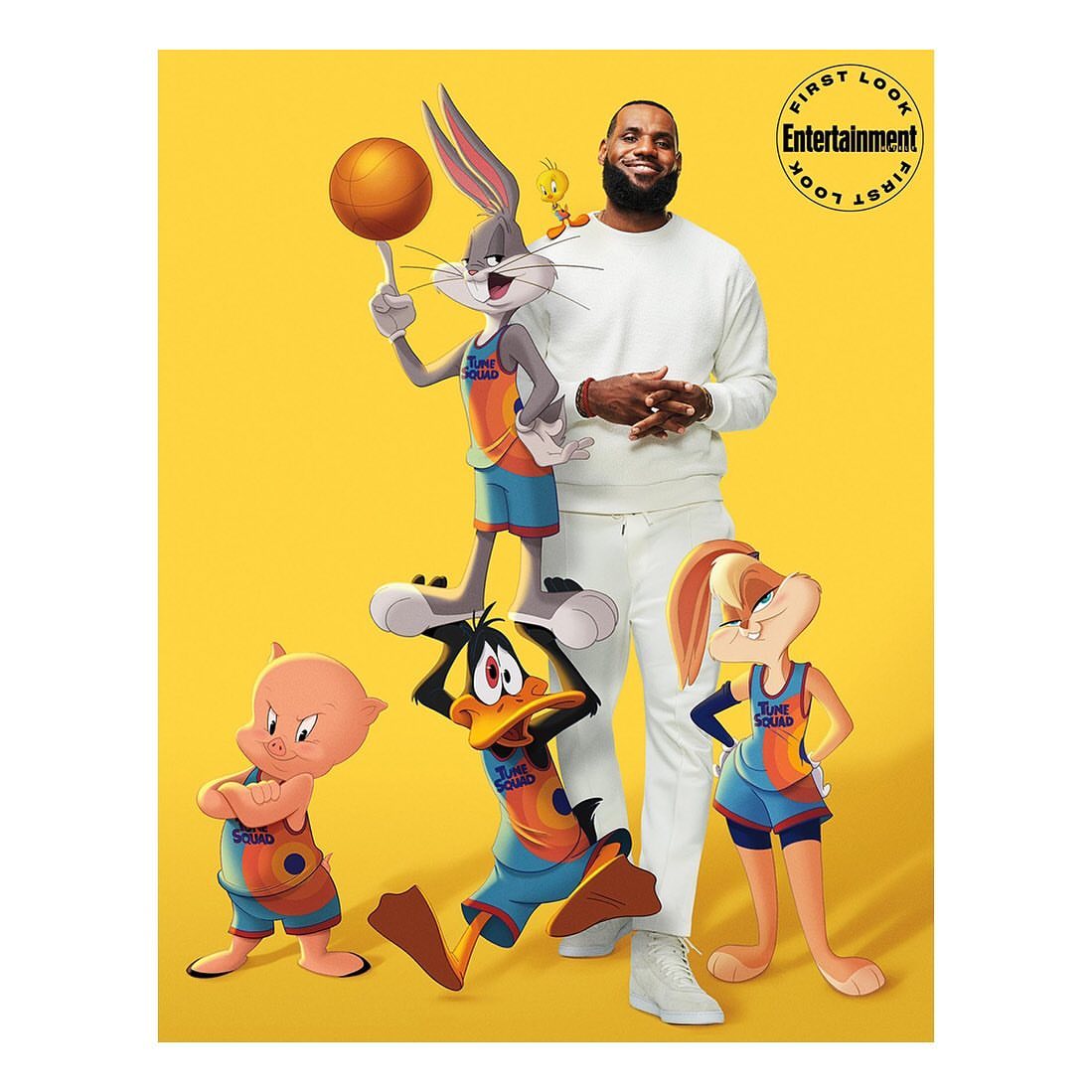 Promotional image for Space Jam 2 featuring LeBron James alongside animated Looney Tunes characters Bugs Bunny, Daffy Duck, and others.