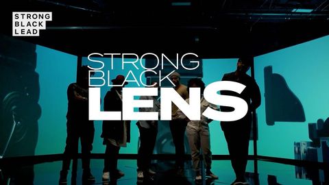 Group of people standing in a studio with blue lighting and the words 'Strong Black Lens' overlaid in white text.
