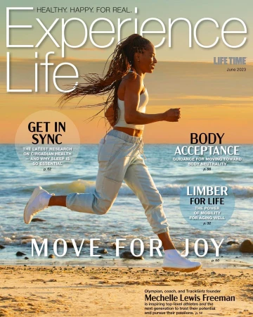 Experience Life magazine cover featuring an African-American woman running on a beach with the sun setting, promoting health, fitness.
