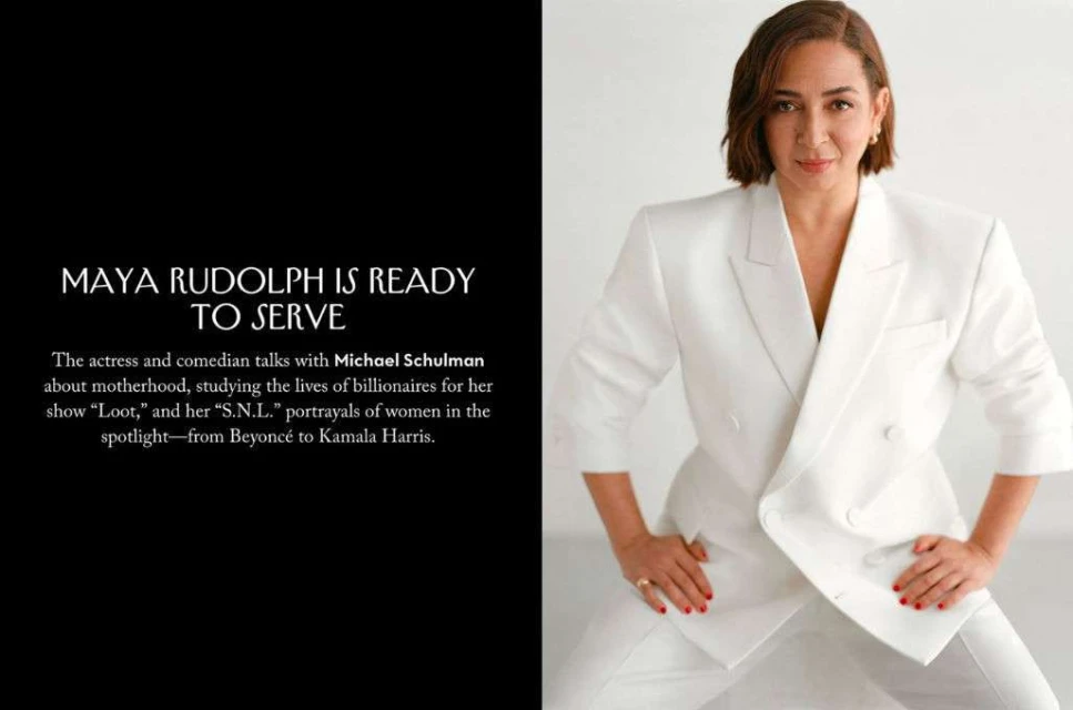 Maya Rudolph poses in a white suit against a white background in a close-up portrait. Text on the left advertises her show.