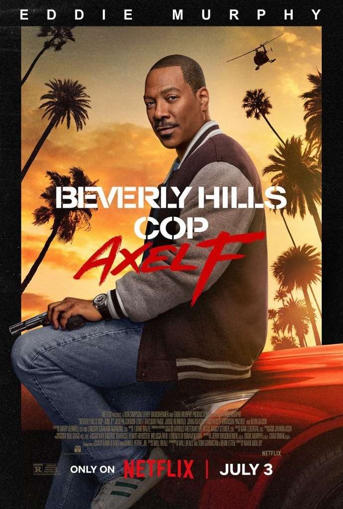 Eddie Murphy as Axel Foley sits on a car in the Beverly Hills Cop: Axel F movie poster with palm trees and a helicopter in the sunset.