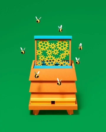 A paper art beehive sculpture with yellow honeycomb gear patterns, surrounded by small paper bees, against a solid green background.