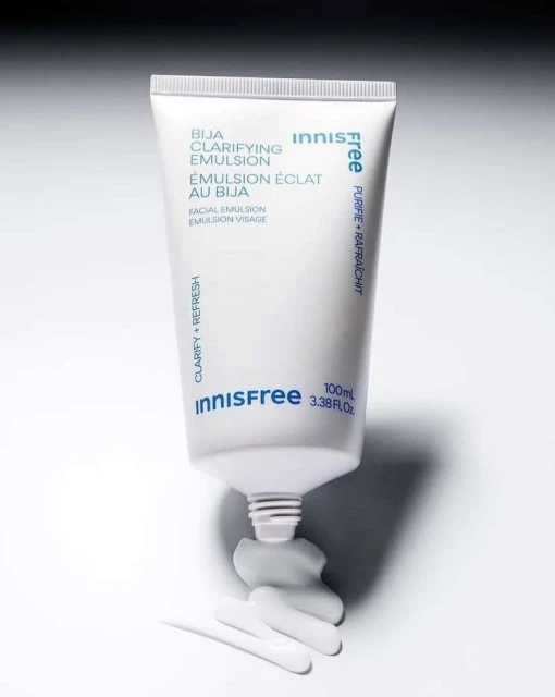 Cosmetic product shot of an innisfree BIJA Clarifying Emulsion tube against a white backdrop, promoting skincare and facial care.