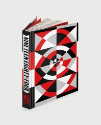 Hardcover book titled Nineteen Eighty-Four with a geometric red, black, white, and grey cover design on a pale background.
