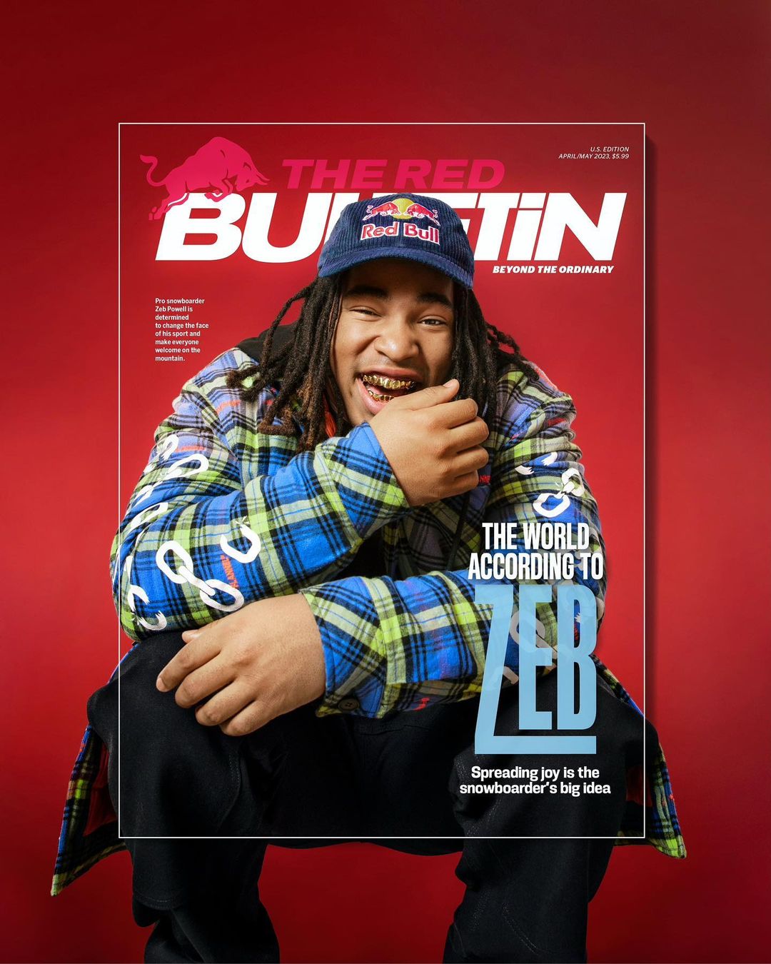 Red Bulletin magazine cover featuring an adult male with dreadlocks wearing a blue plaid jacket and a baseball cap with a Red Bull logo.