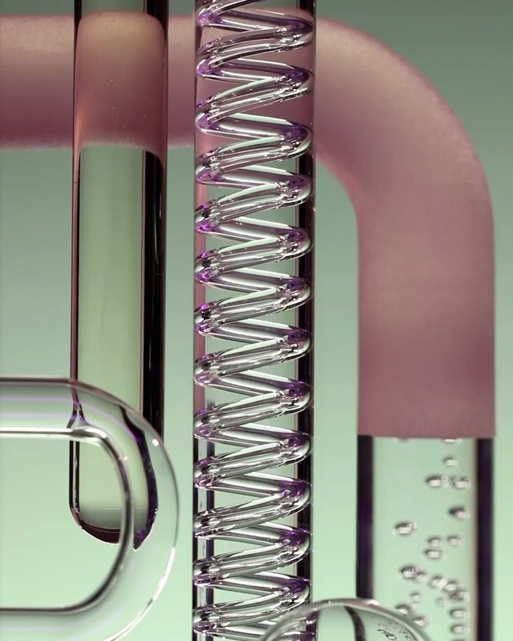 An abstract image of interconnected clear glass pipes and coils against a soft green background, creating a visually intriguing composition.