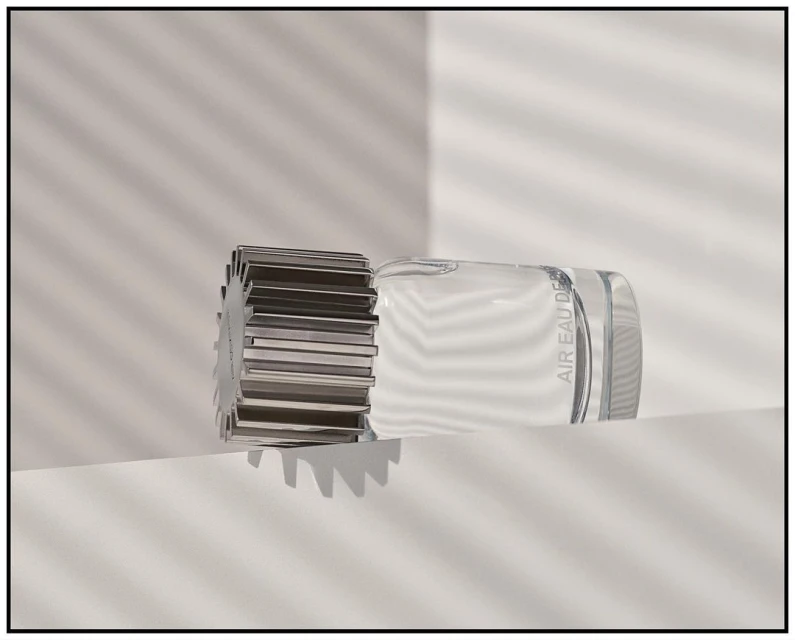 Crystal perfume bottle with a metallic cap, showcased on a clean white surface against a backdrop of soft, linear light patterns.