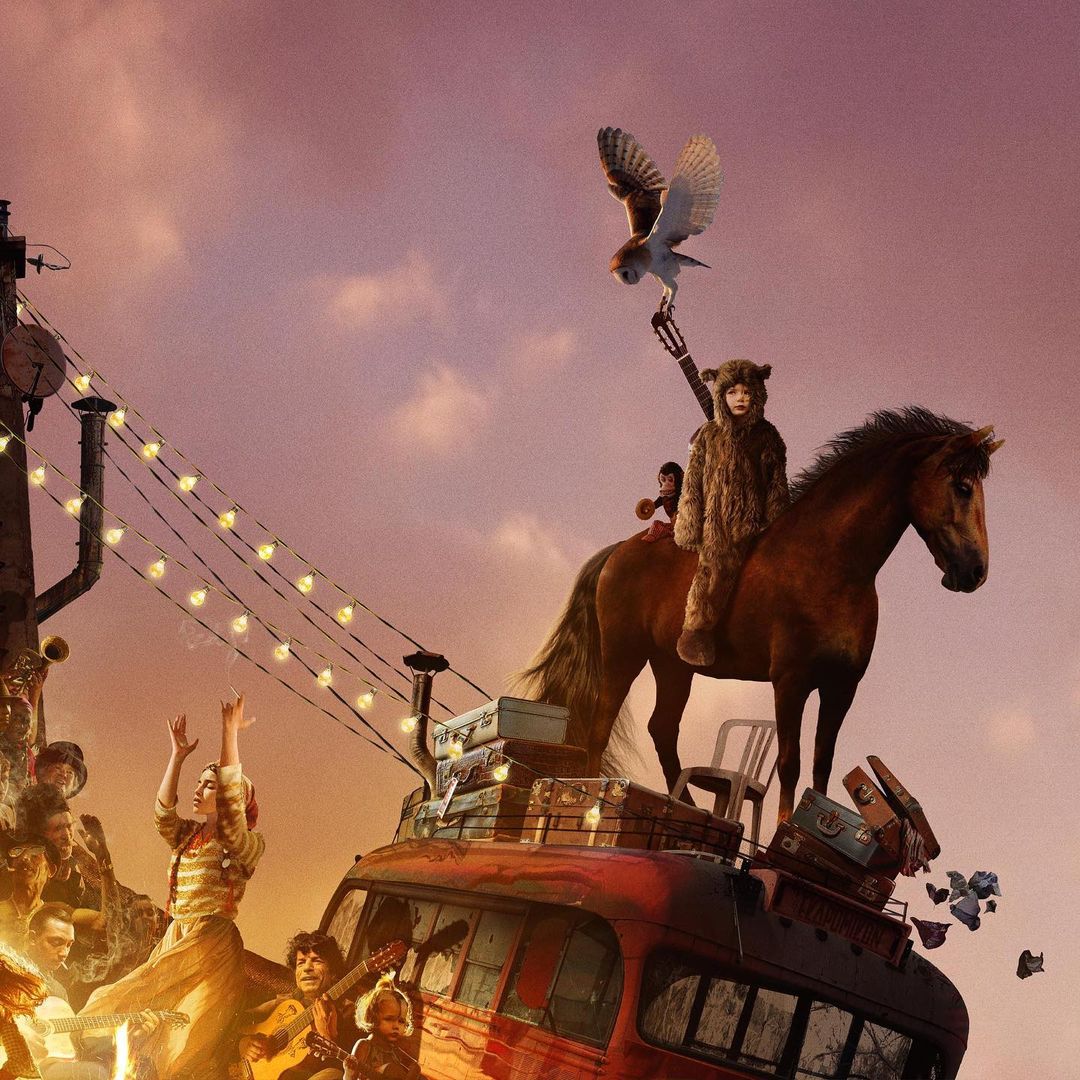 Stylized digital painting featuring a group of people, a horse with a rider, an owl, a bus, and suitcases against a colorful sky backdrop.