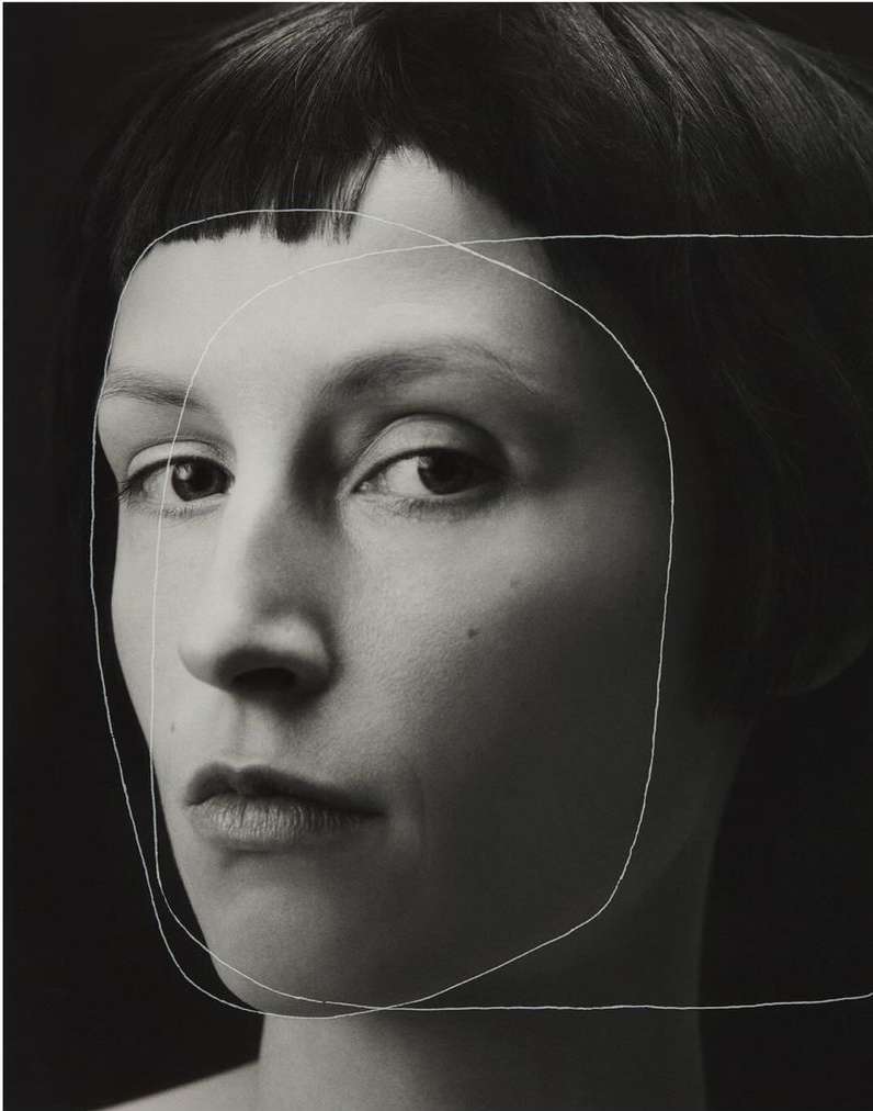Close up portrait of a woman with short dark hair and hand drawn white outline framing her face by Lea Nielsen