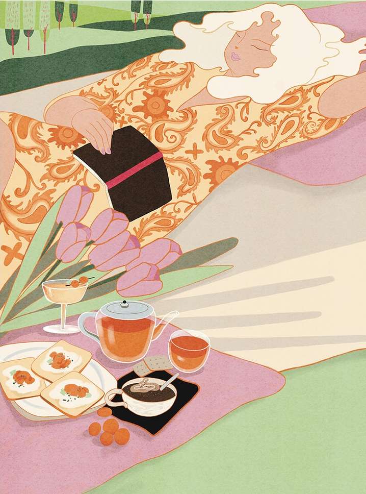 Illustration of woman resting on a blanket with a book next to a picnic set up with tea, pastries and tulips in an outdoor scene.