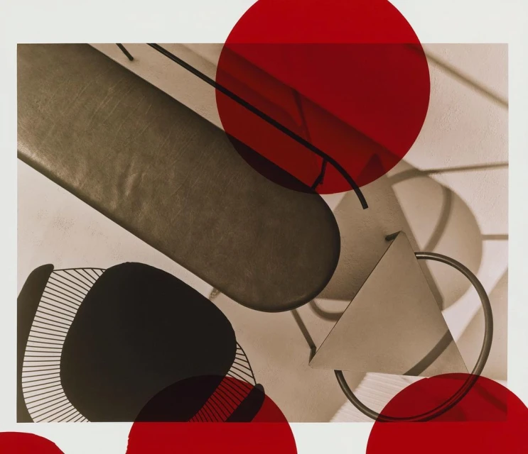 Abstract art photography featuring geometric shapes, shadows, and graphic design elements, with a neutral and red color palette.