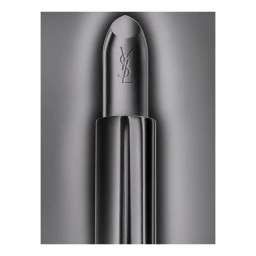 Close-up product photograph of a black lipstick tube with an embossed YSL logo against a gradient grey background.