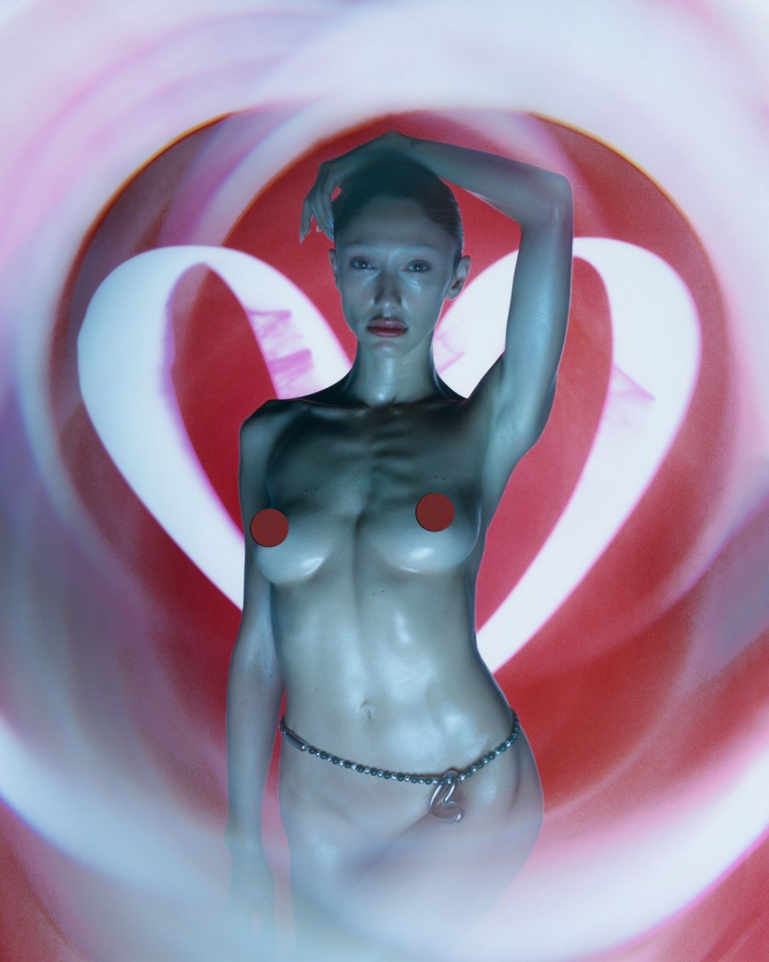 Surreal portrait of a slim adult woman in a studio with a heart-shaped background, showcasing an ethereal beauty concept.